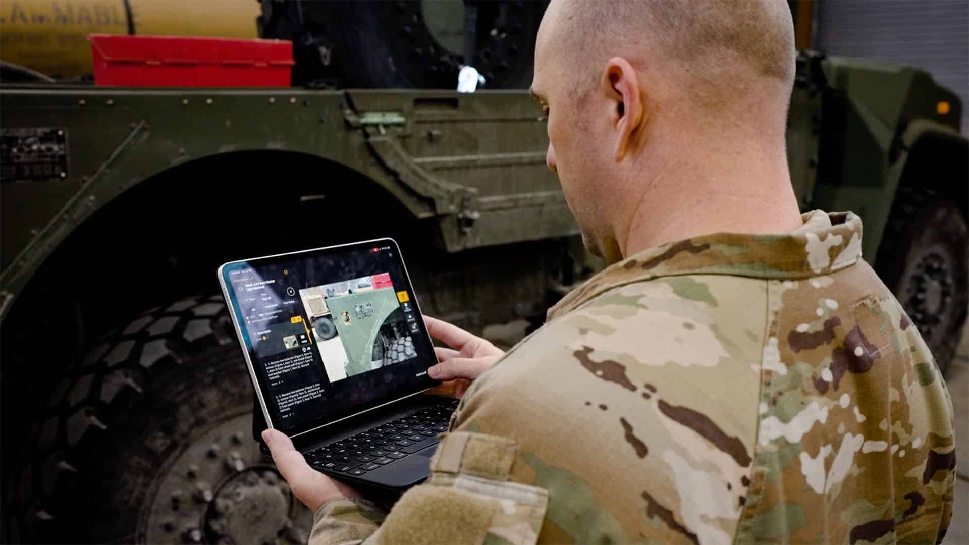 U.S. Army personnel using Taqtile Manifest on a tablet at JBLM